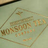 Monsoon Gold Stamp logo